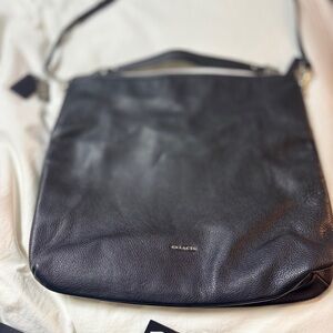 Coach Black Messenger Bag with Leather Material and Single Strap
